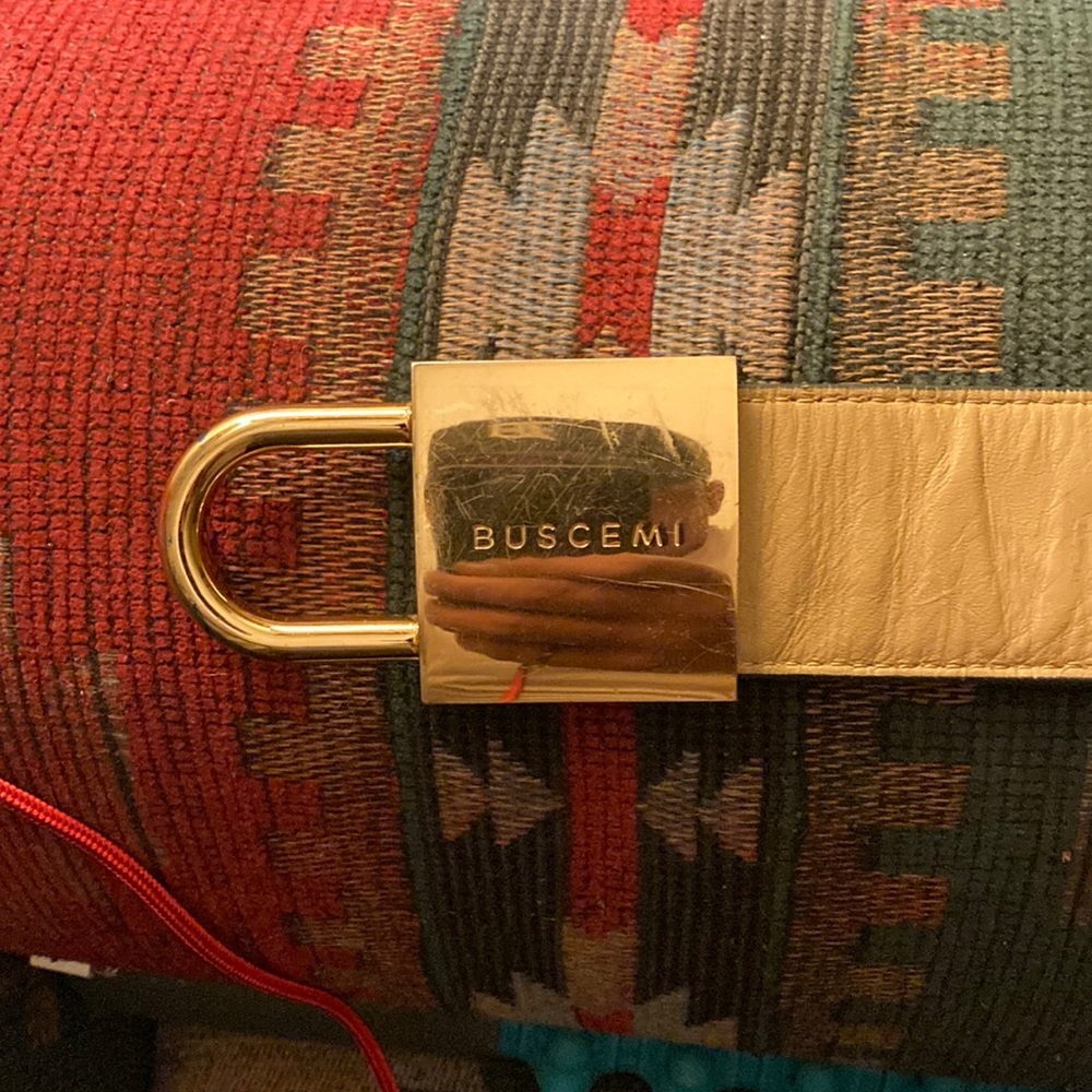 Buscemi camo belt may be reverseable with cream colored leather on opposite